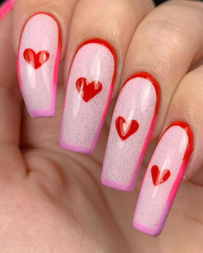 Romantic Pink Base Glitter Nails: Whimsical Hearts for Valentine's