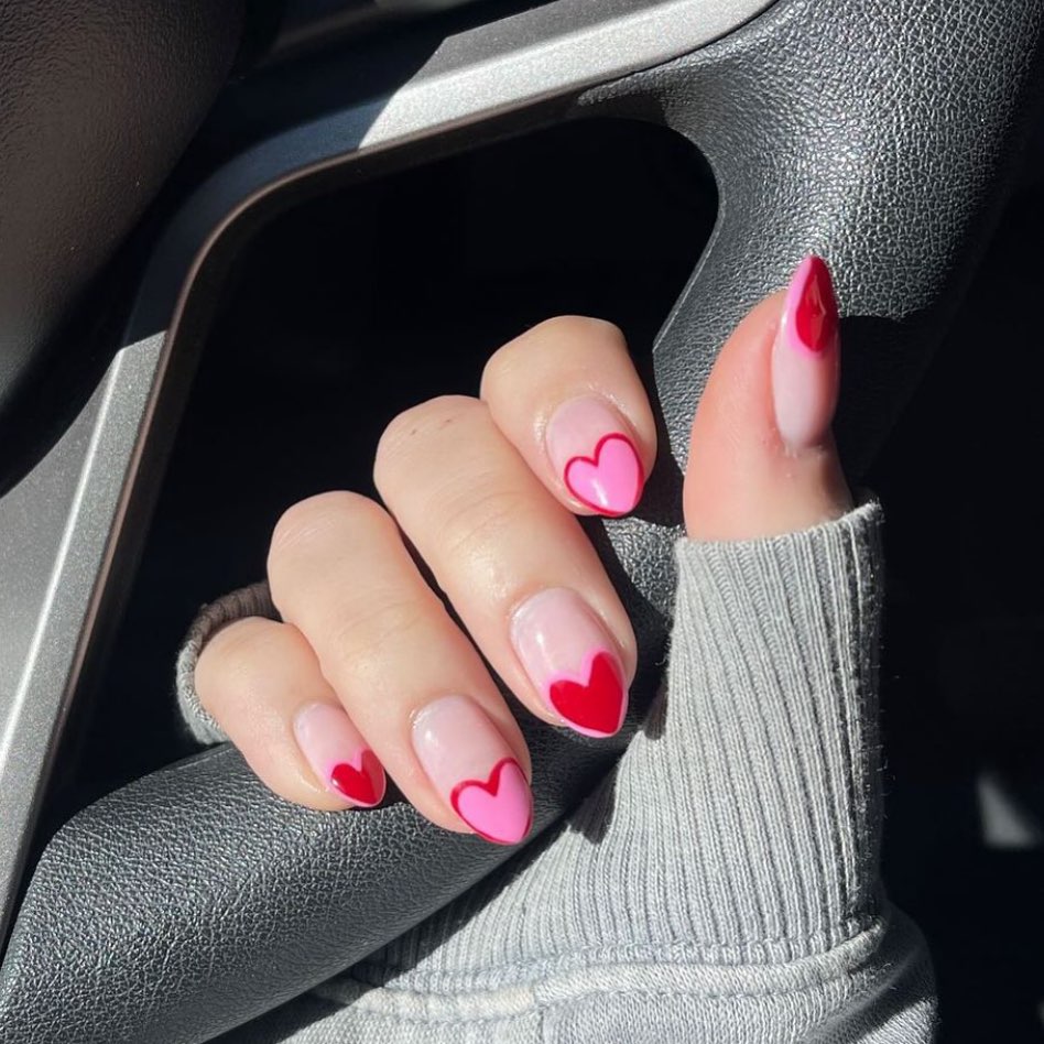 Romantic Flare: Valentine's Day Nail Art with Red Heart Tips