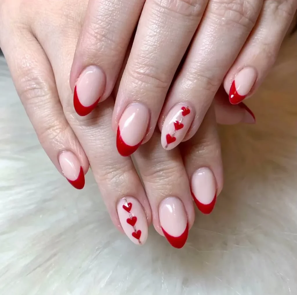 Romantic Red French Tips with Hearts for Valentine's Day