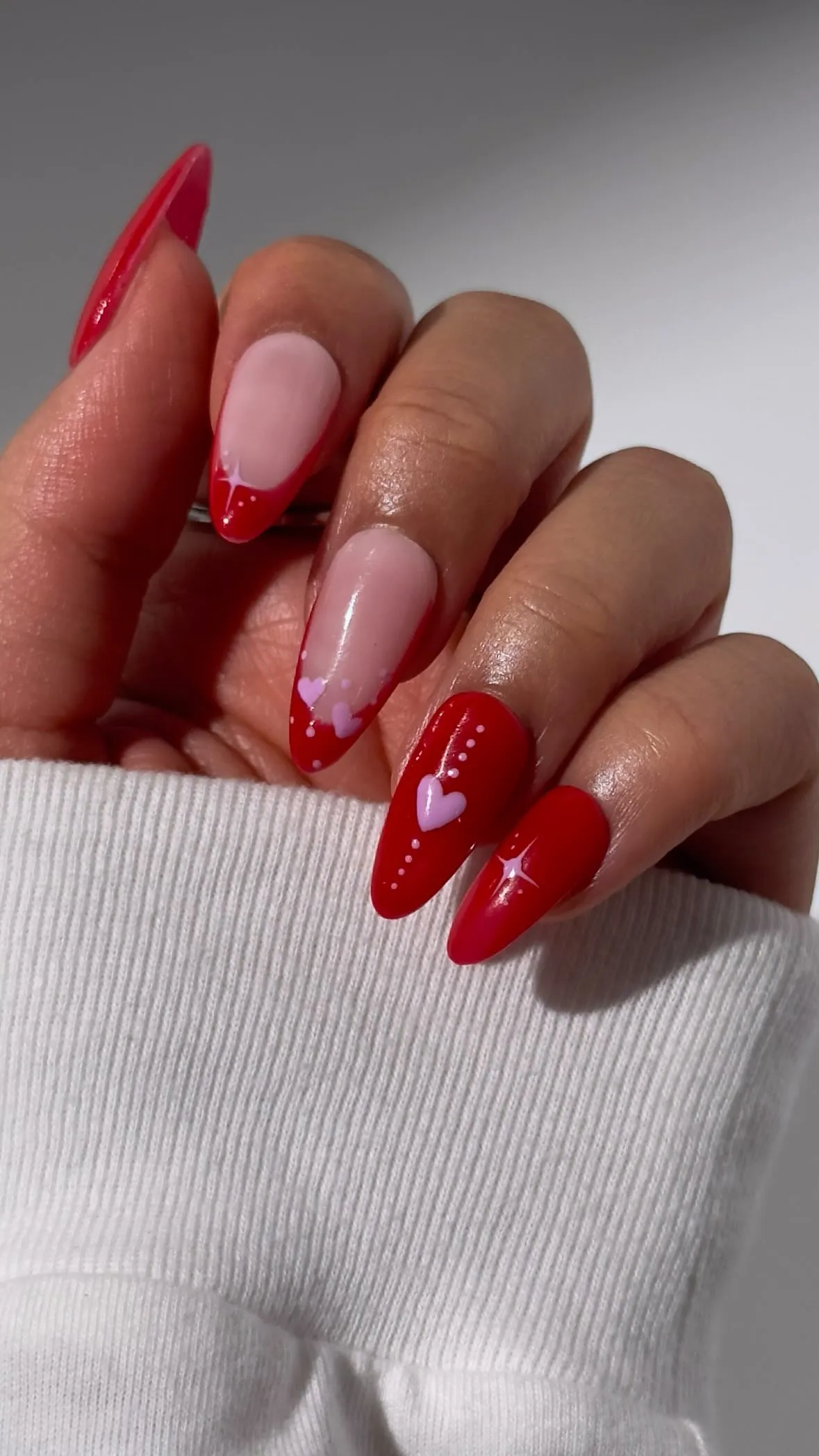 Lovely Valentine's Day Nail Design: Romantic Red and Soft Pink